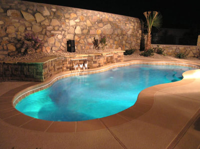 in-ground fiberglass pool in Las Vegas backyard